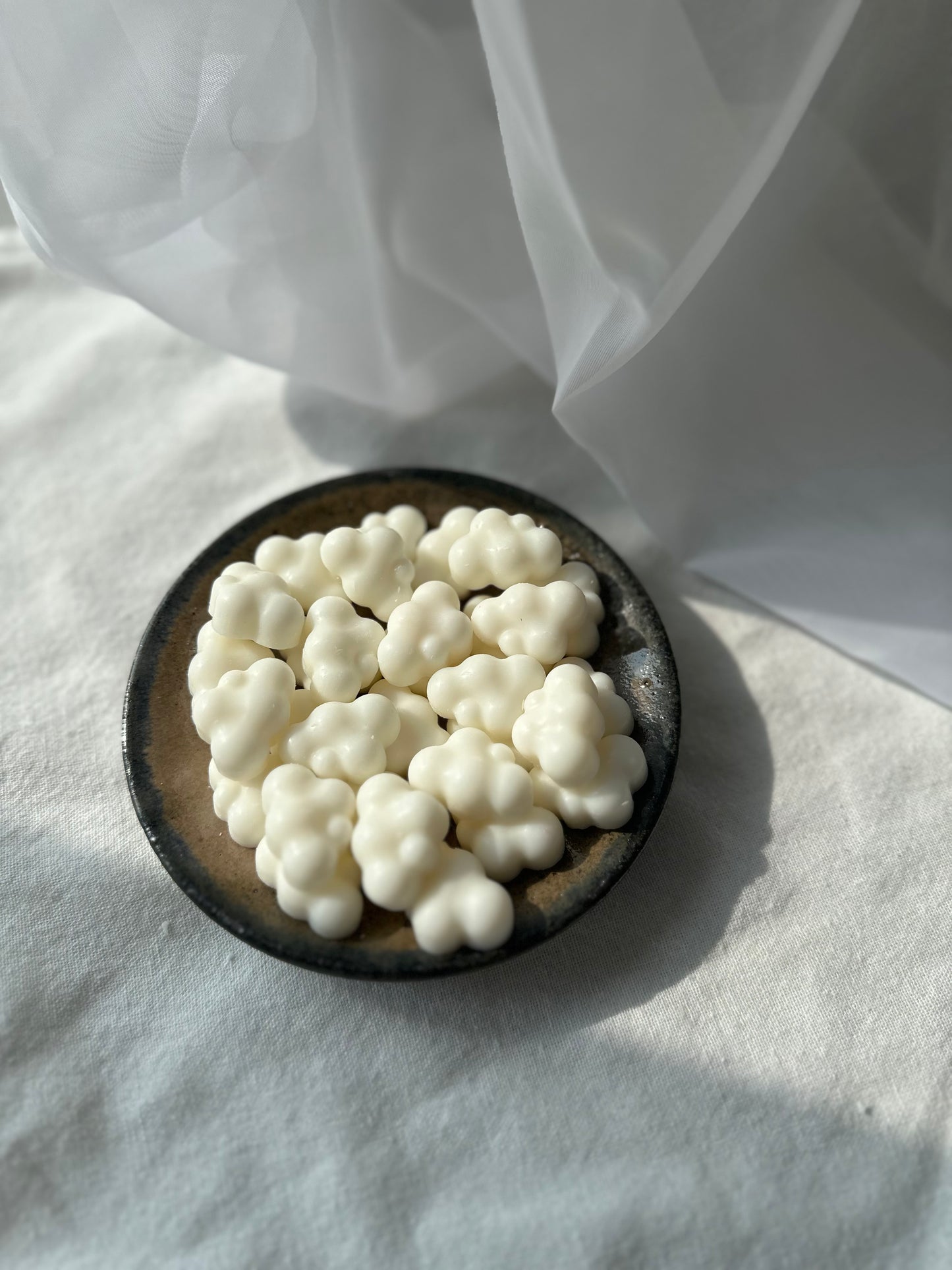 MAMO’s botanical wax melts for calm rituals, photographed in soft natural light