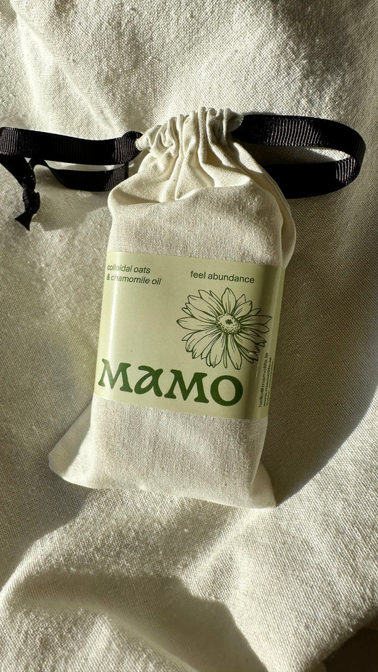 Luxury Irish-made soap with colloidal oats and chamomile on linen packed in a cotton bag