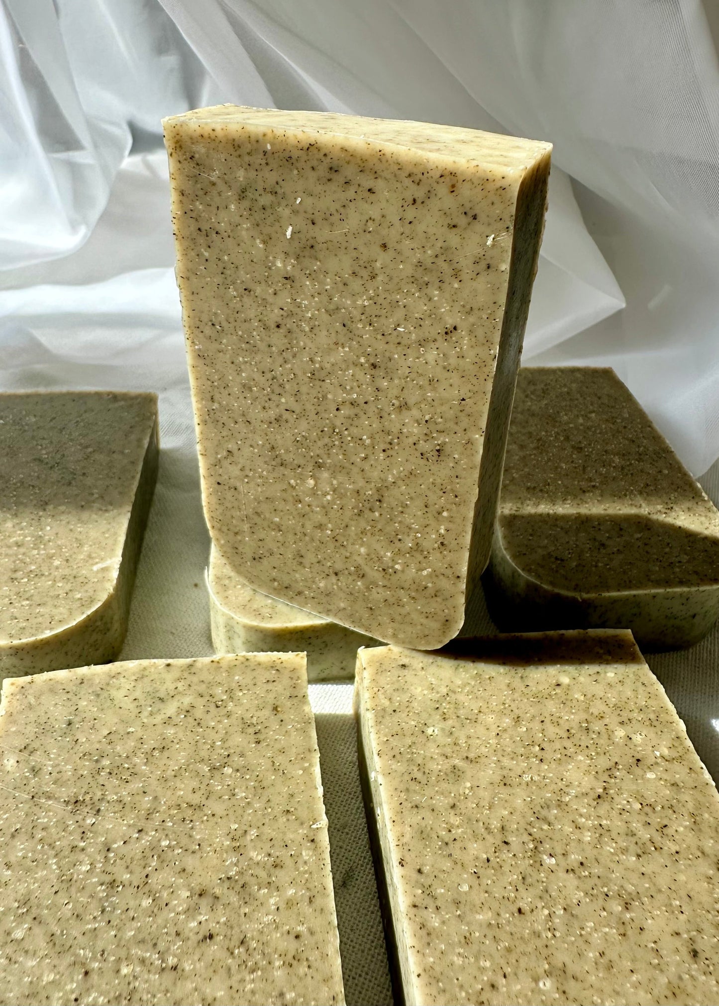 Zero-waste rosemary and mint soap bar with green clay, perfect for post-workout refresh.