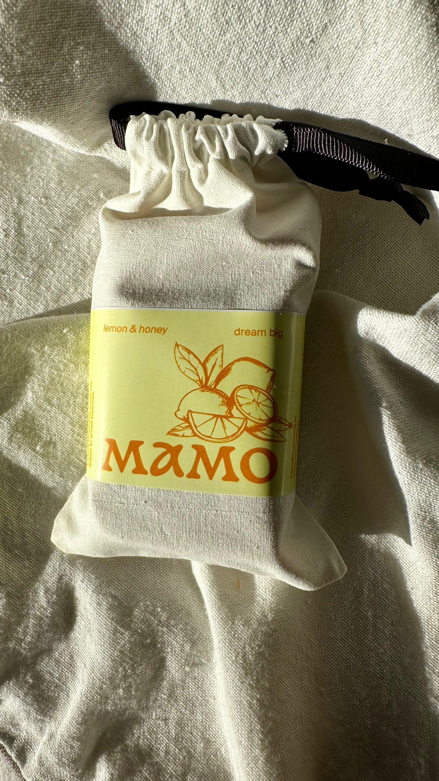 Natural citrus and honey soap for daily cleanse in  a cotton bag