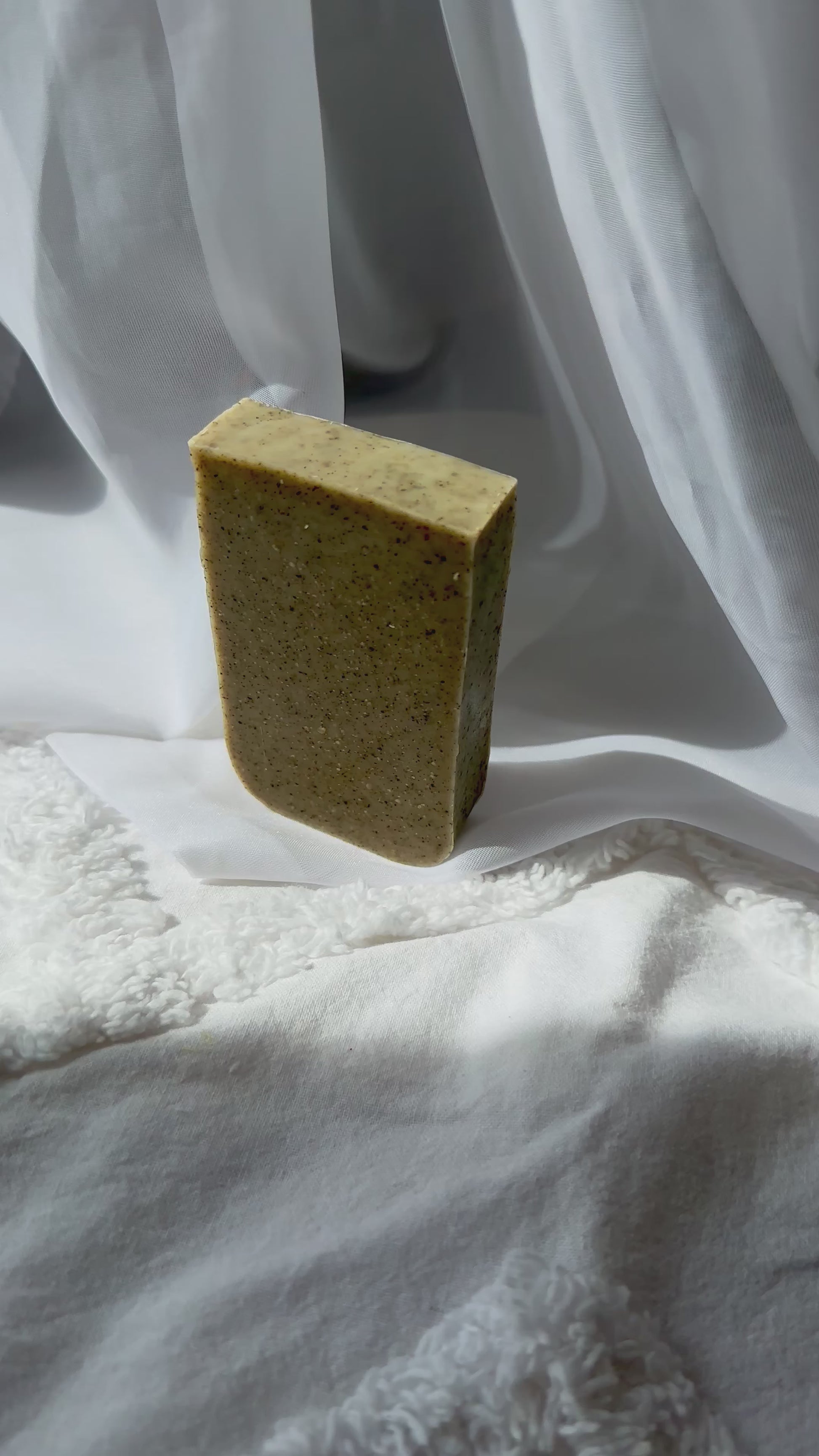 Detail on green clay and mint natural soap bar for clarifying skin